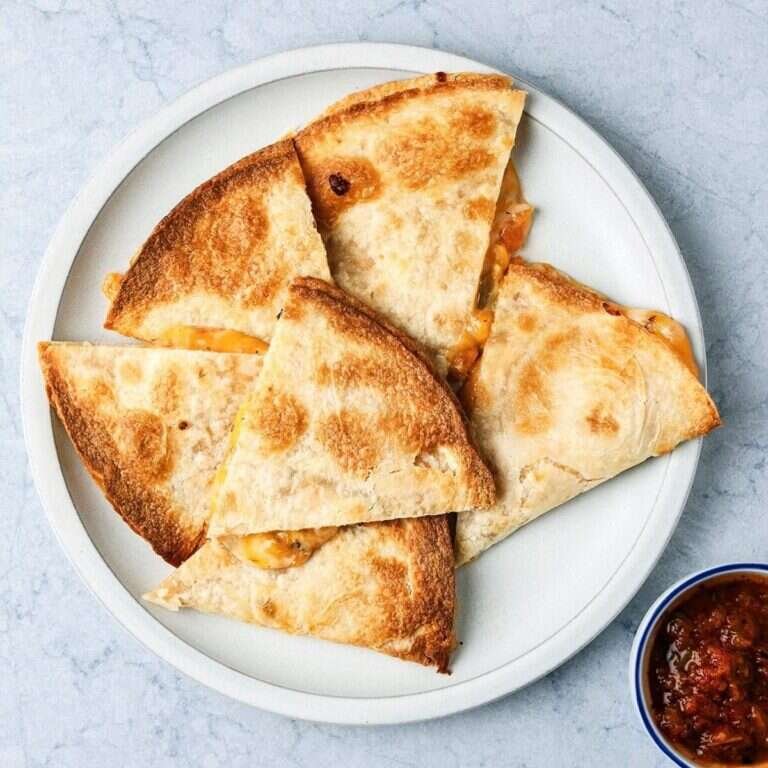 Easy Air-Fryer Quesadillas Recipe for Quick Family Meals Air-fryer quesadillas with crisp tortillas and melted cheese