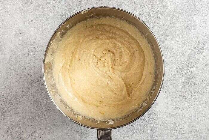 Dry ingredients being mixed into banana bar batter