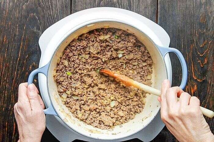 Italian sausage and ground beef cooking for lasagna meat sauce