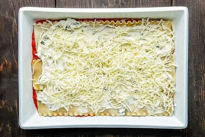 Layered lasagna assembled in a 13x9-inch baking dish
