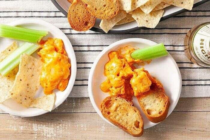 Hot baked Buffalo chicken dip with melted Colby-Monterey Jack cheese