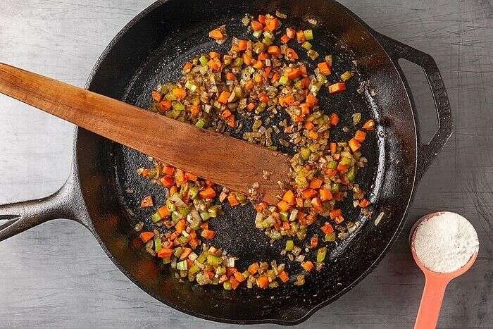 Onion, celery, and carrots sauteed in butter for chicken potpie filling