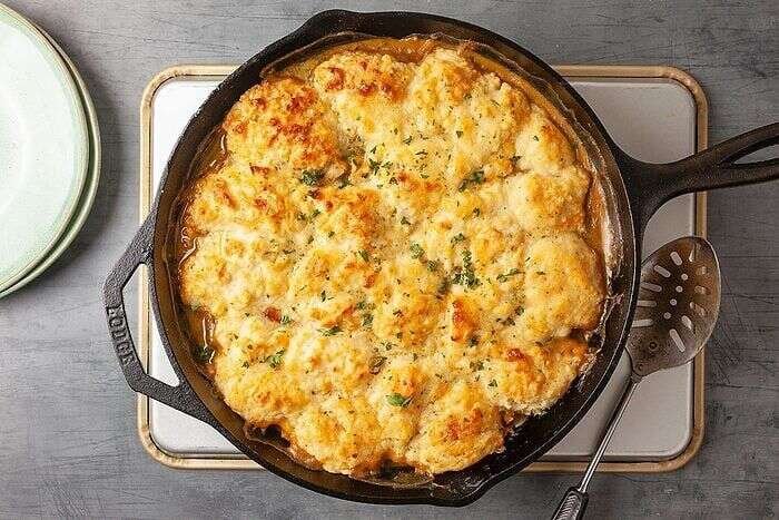Baked Cheddar Bay Chicken Potpie resting with golden biscuit topping