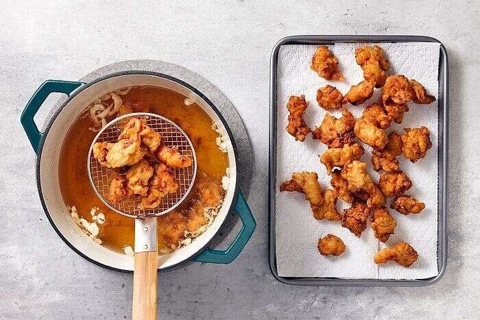 Golden fried chicken pieces for copycat orange chicken