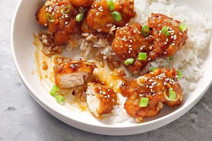 Copycat Panda Express orange chicken served with rice