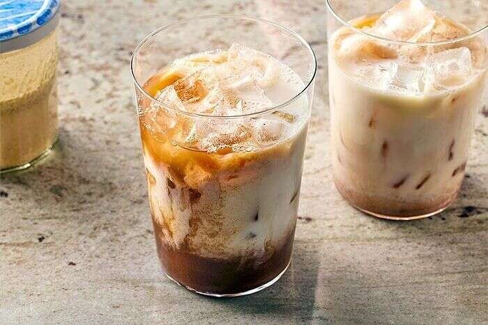 Iced chai latte with creamy milk and ice