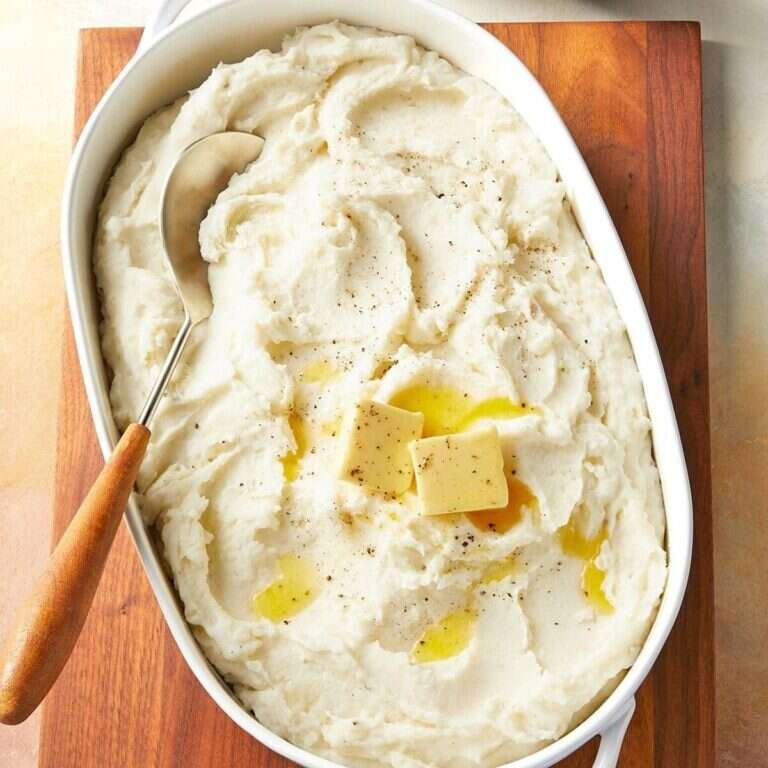 Easy Make-Ahead Mashed Potatoes Recipe for Holidays Creamy make-ahead mashed potatoes in a serving dish