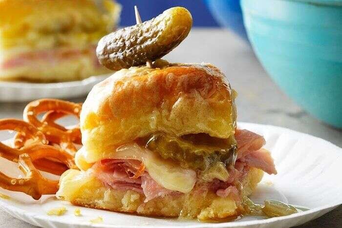 Golden Cuban sliders baked with buttery Dijon topping