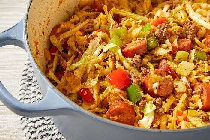 Close-up of dirty cabbage with tender cabbage, sausage, and seasoned vegetables
