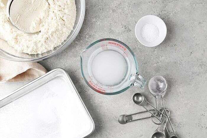 Flour, salt, baked baking soda, and water prepared for ramen dough