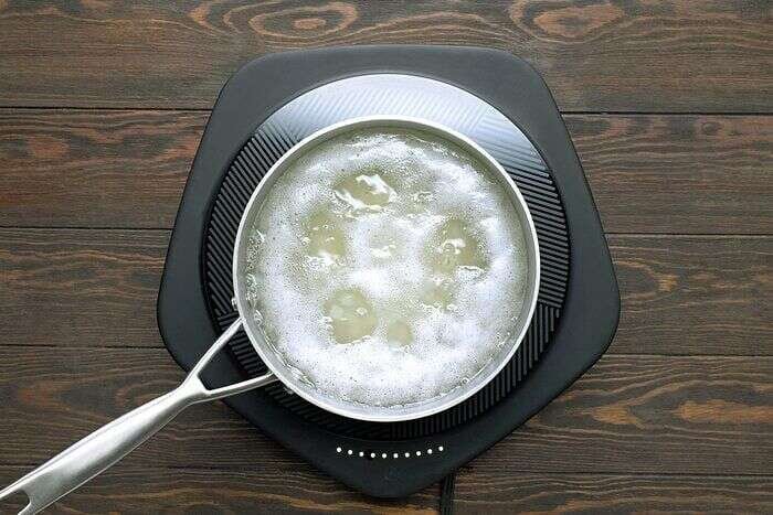 Boiling potatoes for Korean corn dogs