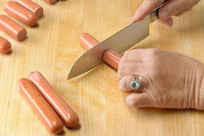 Hot dogs cut in half for Korean corn dogs