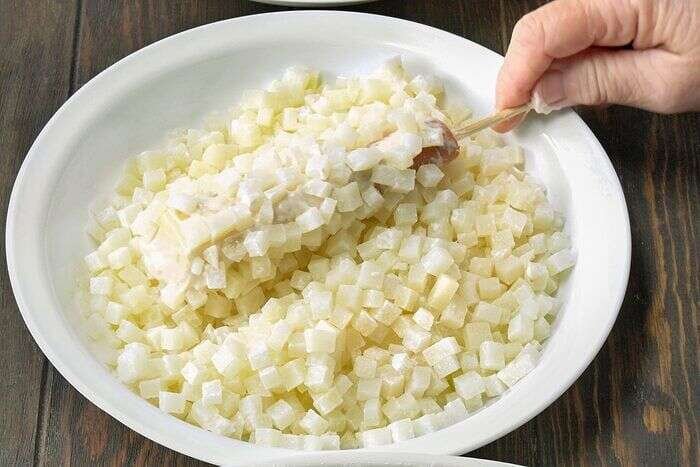 Potato cubes pressed onto Korean corn dog batter