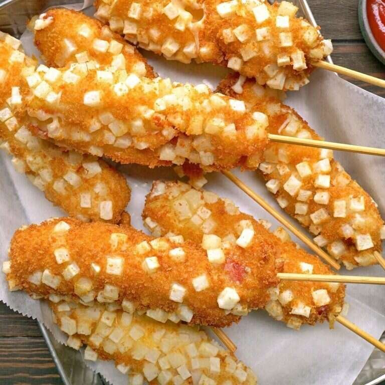 Easy Korean Corn Dog Recipe with Crispy Potato Coating Korean corn dog with crispy potato and panko coating