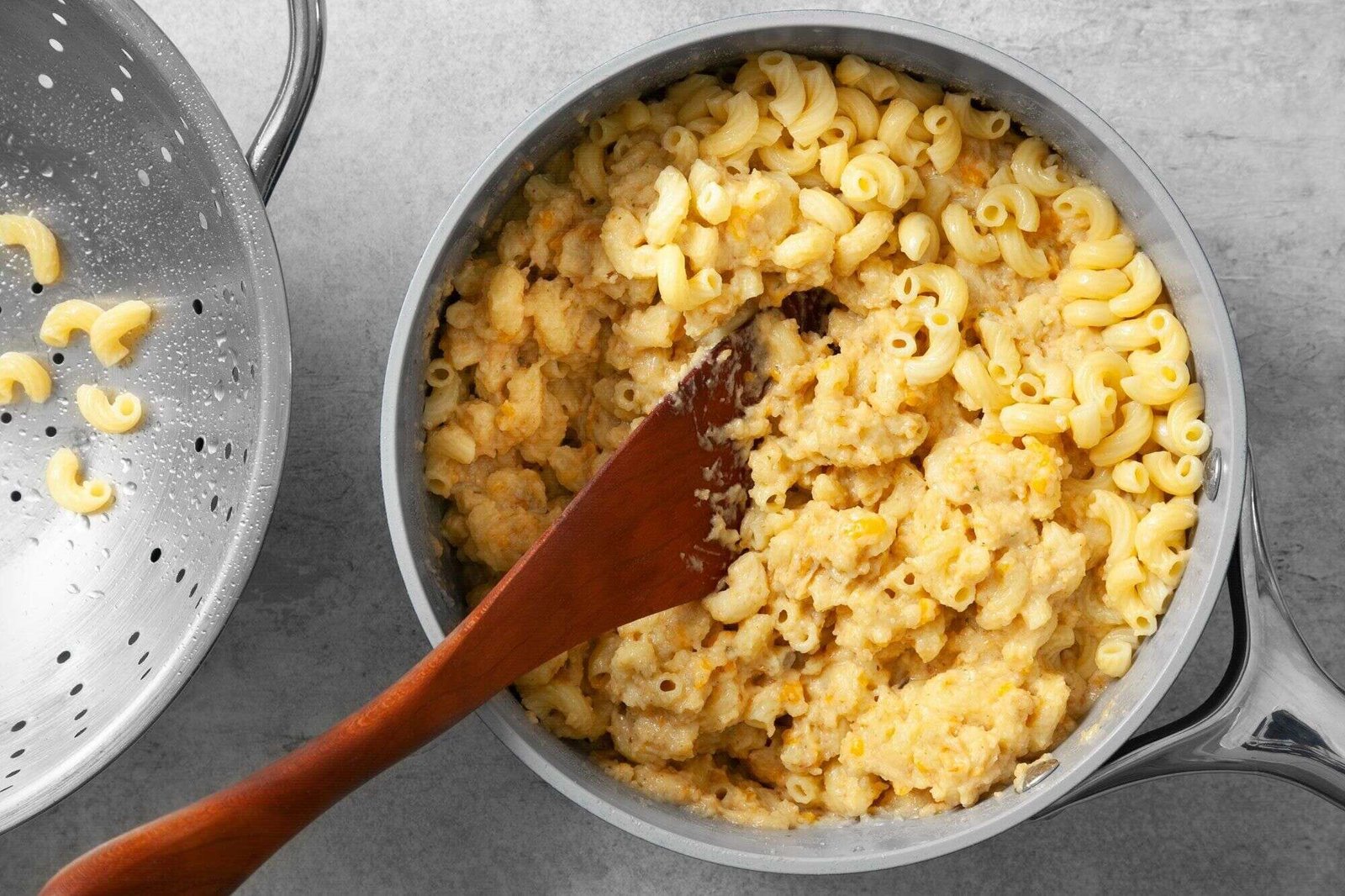 Cooked macaroni tossed into the creamy cheese mixture