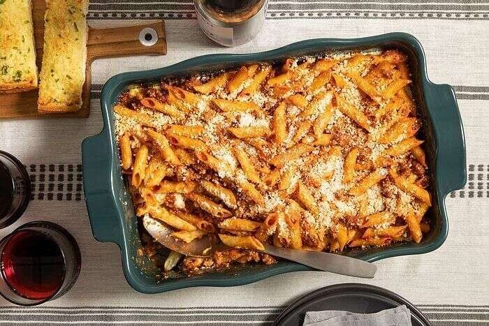 Baked mostaccioli casserole with pasta, cheese, and bread