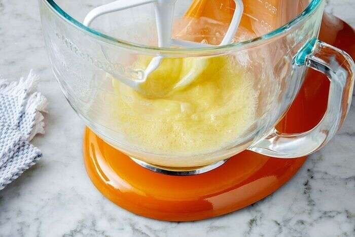 Beating eggs for orange olive oil cake batter