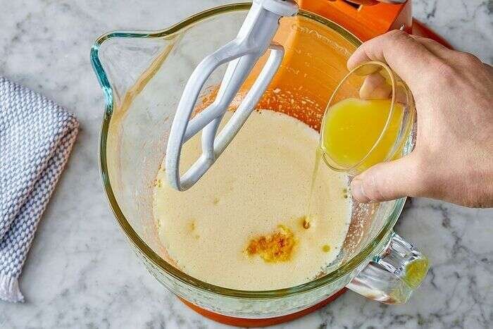 Olive oil, milk, orange zest, and orange juice added to cake batter