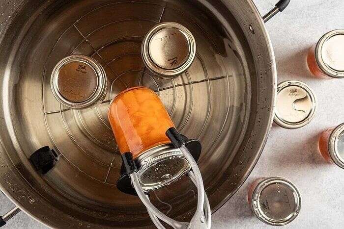 Pear preserves jars processing in a boiling water canner