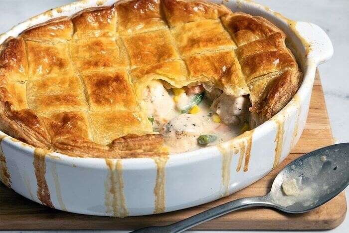Golden baked puff pastry chicken potpie ready to serve