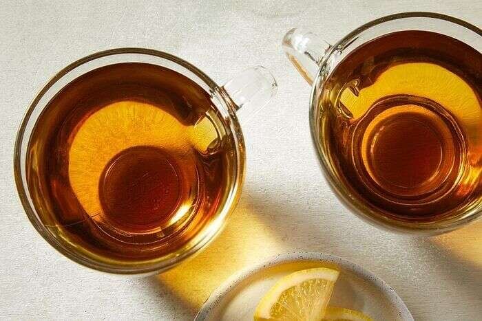 Spearmint tea served in clear glass teacups