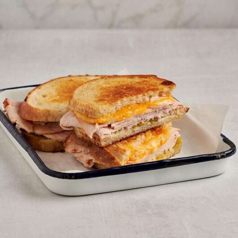 Easy Turkey Melt Recipe with Sourdough and Green Chiles Golden turkey melt with sourdough bread, green chiles, deli turkey, and melted cheese