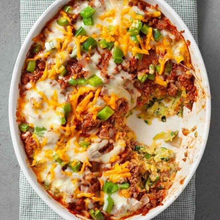 Easy Zucchini Pizza Casserole Recipe for Family Dinners Zucchini pizza casserole with cheesy zucchini crust and beef topping