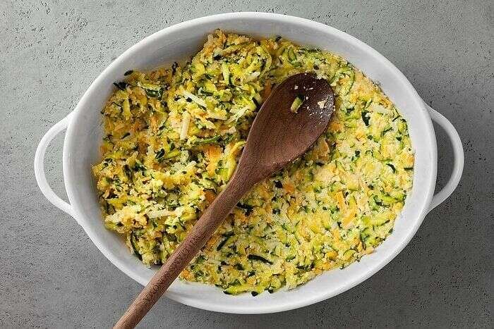 Zucchini mixed with eggs Parmesan mozzarella and cheddar cheese